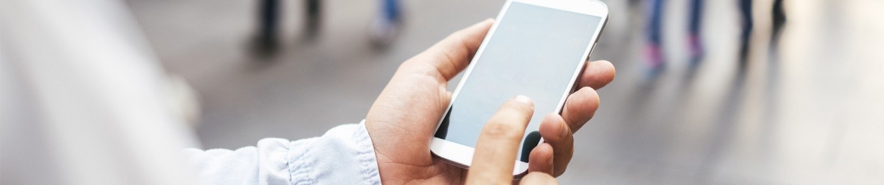 woman holding smart phone. 